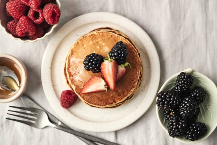 Low Carb Protein Pancakes (No Protein Powder!) Fluffy protein pancakes topped with fresh berries.