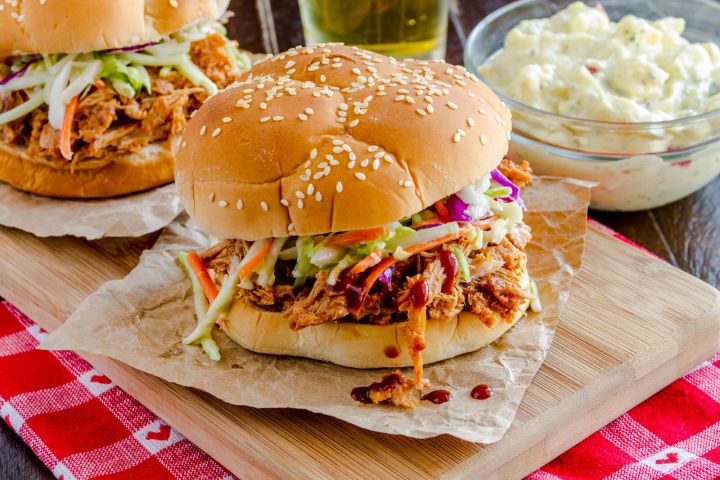 Slow Cooker BBQ Turkey Breast Slow Cooker Barbecue pulled turkey on a bun with coleslaw.