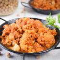 10 Easy and Delicious Slow Cooker Chickpea Recipes Slow cooker chickpea masala with cauliflower in tomato sauce with Indian spices and cilantro.