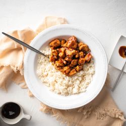 Spicy Skillet Hoisin Chicken Spicy skillet hoisin chicken with chicken breast covered in hoisin sauce and served with rice.