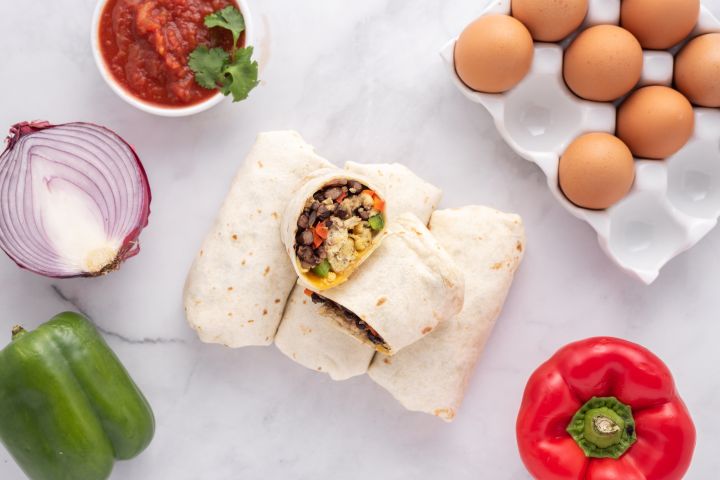 30 Best Freezer Friendly Recipes Freezer friendly breakfast burritos with eggs, black beans, peppers, salsa, and onions.