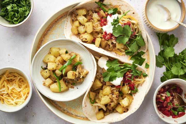 Potato Green Chile Tacos Potato green chile tacos with chopped potatoes, poblano peppers, onions, and salsa served in corn tortillas.