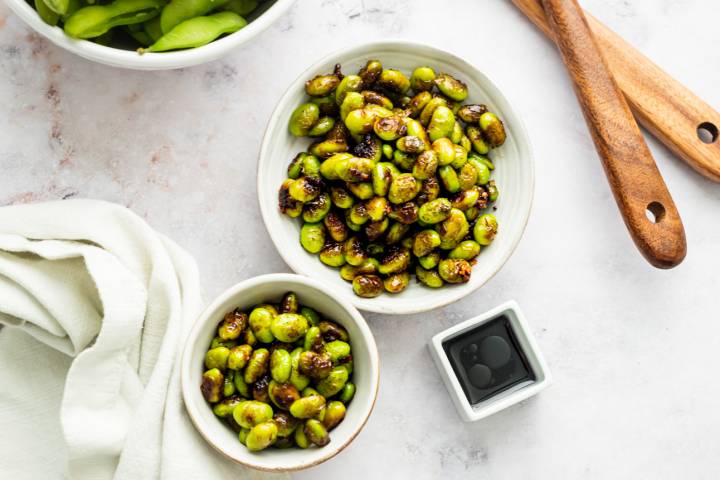 Sauteed Shelled Edamame Sauted shelled edamame with caramelized edges served with soy sauce and chili flakes.