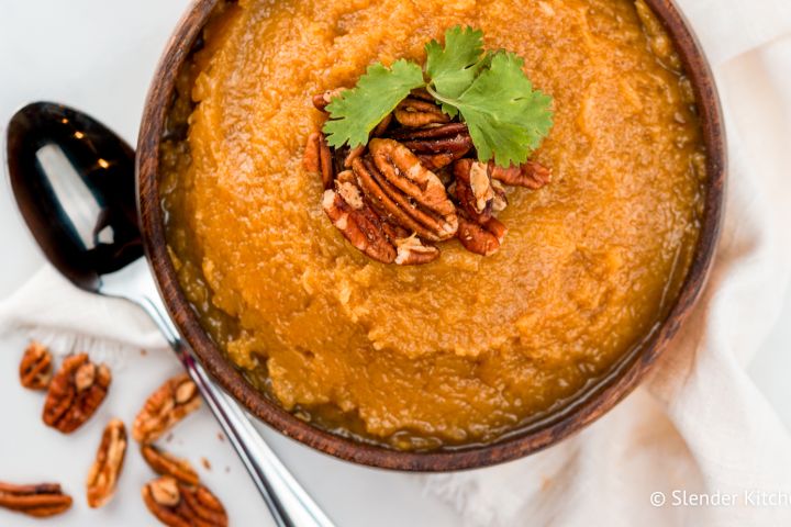 Slow Cooker Brown Sugar Butternut Squash Slow cooker butternut squash served in a wooden bowl.