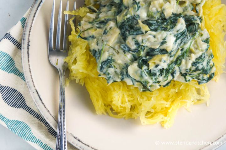Creamy Spinach Artichoke Sauce Spinach and artichoke sauce served over a bed of spaghetti squash.