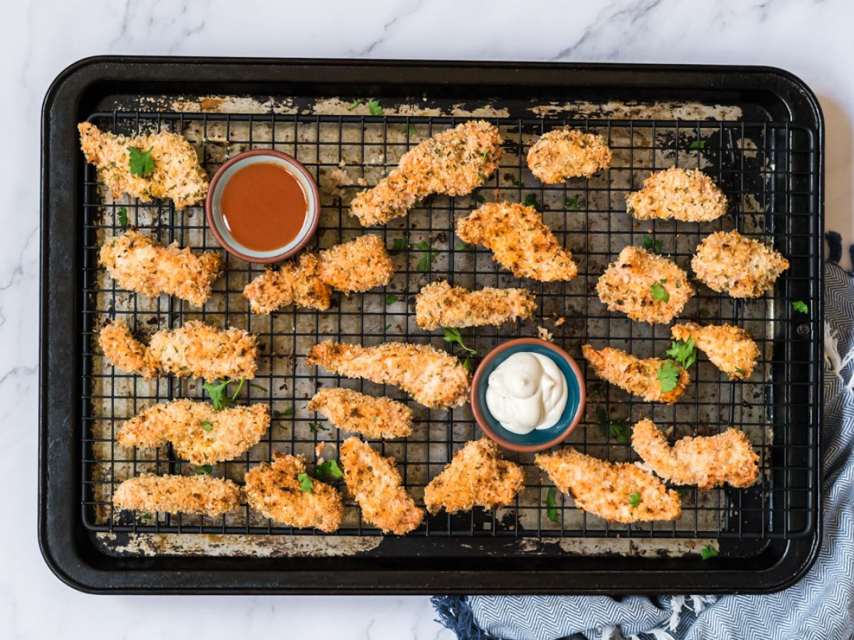 Quick and Easy Chicken Dinner Recipes Buffalo chicken tenders coated with panko breadcrumbs and ranch served with ranch dressing and buffalo sauce.