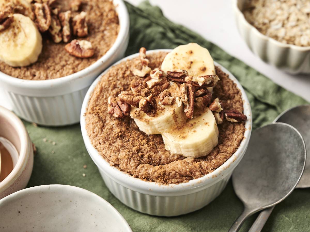 High-Protein Breakfasts Protein baked oats topped with banana and pecans