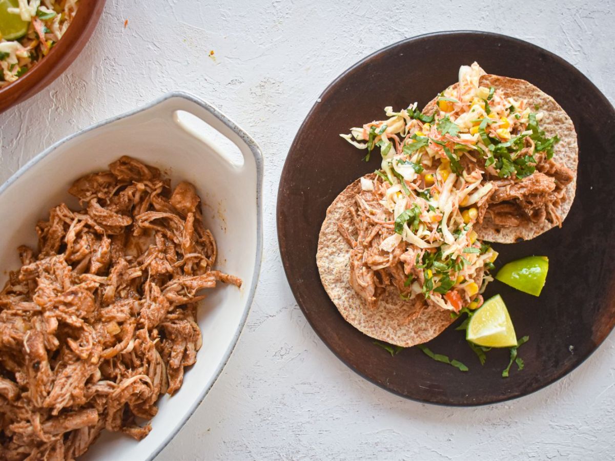 Slow Cooker Pork Recipes Slow Cooker Chorizo Spiced Pulled Pork in a corn tortilla with cabbage slaw.