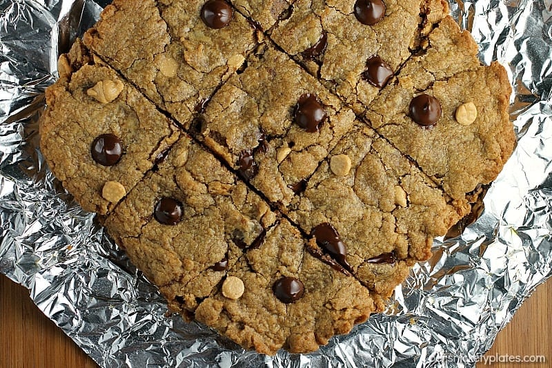 Peanut Butter Blondies filled with chocolate chips and peanut butter chips are soft and chewy and begging to be topped with vanilla ice cream! | Persnickety Plates