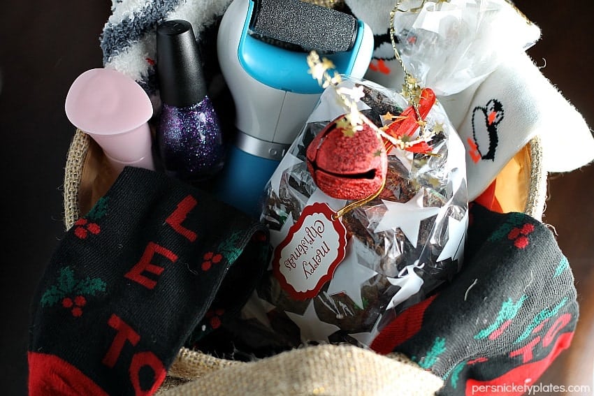 If you're struggling with a gift idea for just about anyone on your list this year, I've got an idea for you! Mix a homemade treat (like these Double Chocolate Chewy Bars) with a gift basket full of items to help the recipient pamper themselves. Thoughtful, useful, and delicious - you can't go wrong! | Persnickety Plates AD