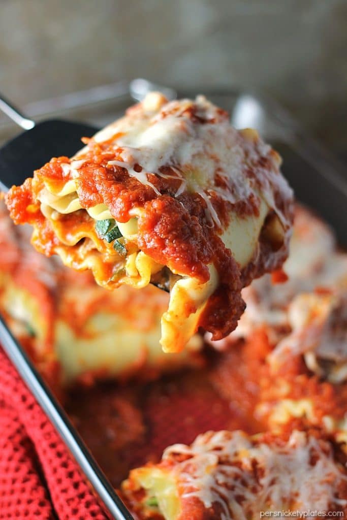 These Veggie Lasagna Roll-Ups are filled with spinach, zucchini, and cheeses and smothered in Classico Riserva's new Eggplant and Artichoke sauce. | Persnickety Plates