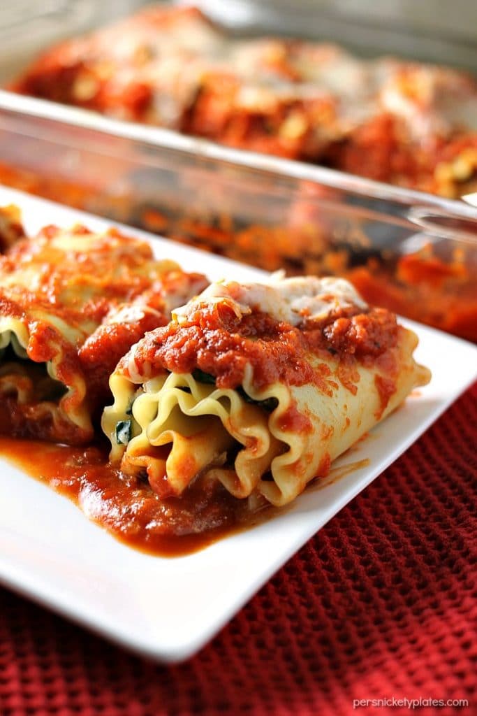 These Veggie Lasagna Roll-Ups are filled with spinach, zucchini, and cheeses and smothered in Classico Riserva's new Eggplant and Artichoke sauce. | Persnickety Plates