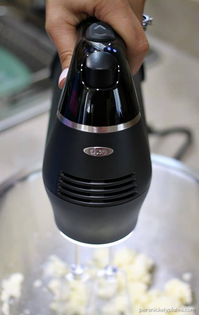 Salted Chocolate Caramel Bars start with a layer of chocolate shortbread, topped with a thick layer of homemade salted caramel, and finished off with toasted pecans. | Persnickety Plates