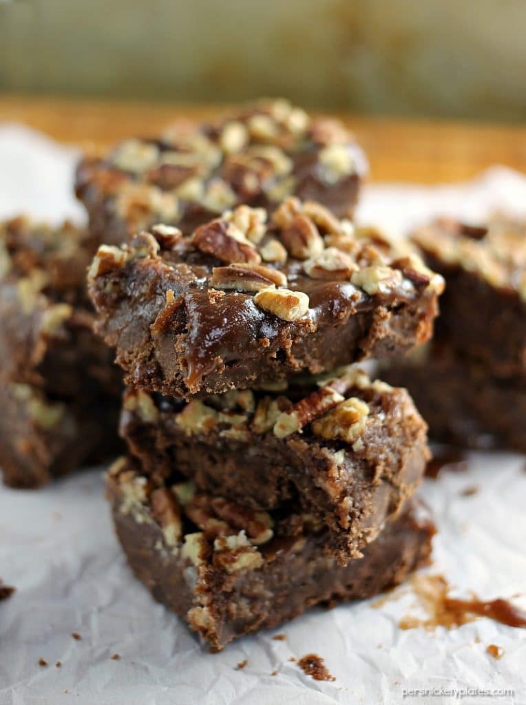 Salted Chocolate Caramel Bars start with a layer of chocolate shortbread, topped with a thick layer of homemade salted caramel, and finished off with toasted pecans. | Persnickety Plates