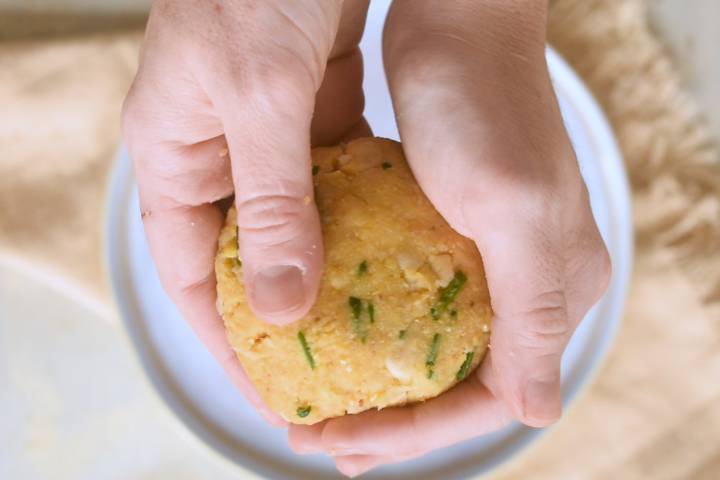 Chickpea mixture being formed into burger patties.
