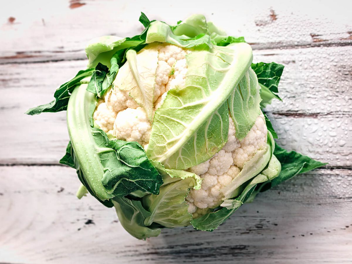 Fresh cauliflower on a wooden surface