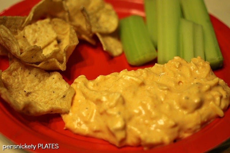 Buffalo Chicken Dip has just FIVE ingredients and it makes a big batch that's perfect for parties, get-togethers, or game days! This dip couldn't be easier to make because it's a slow cooker dip recipe! Put the ingredients into a crock pot and you can serve the dip right from the slow cooker, too! Slow Cooker Buffalo Chicken Dip | Persnickety Plates