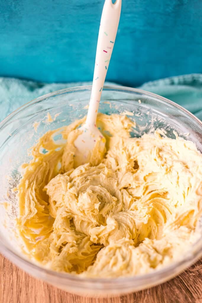 vanilla cupcake batter in a mixing bowl.