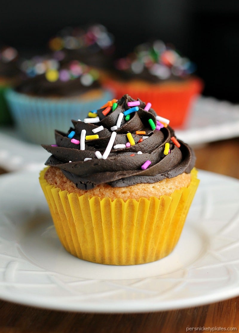 Vanilla Cupcakes made from scratch should be a staple recipe in every bakers' arsenal. This recipe makes a small batch perfect to satisfy a craving. | www.persnicketyplates.com