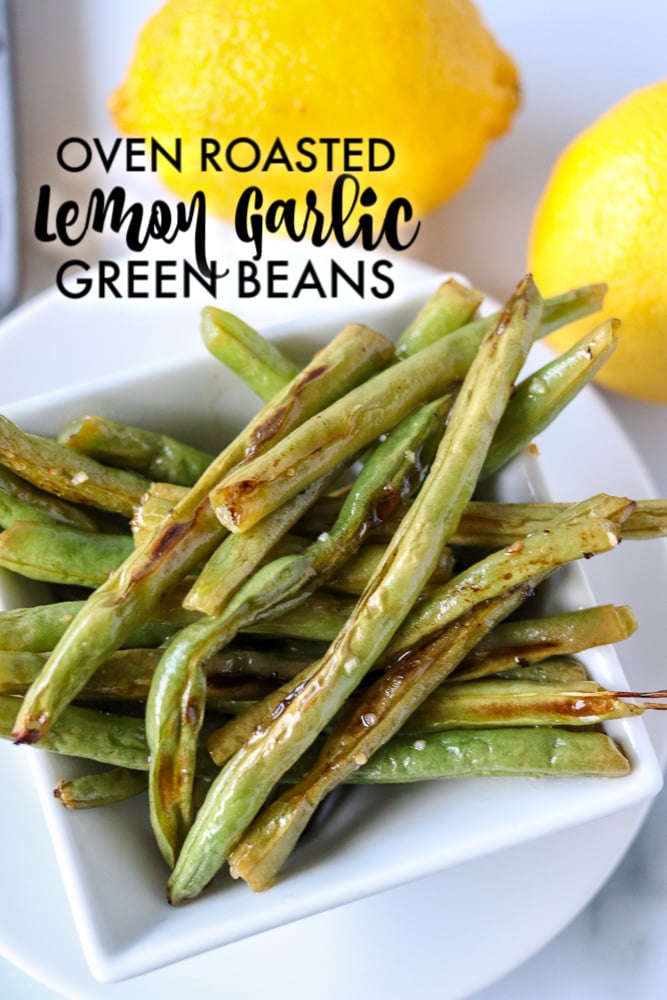 bowl of green beans with text overlay reading "oven roasted lemon garlic green beans".