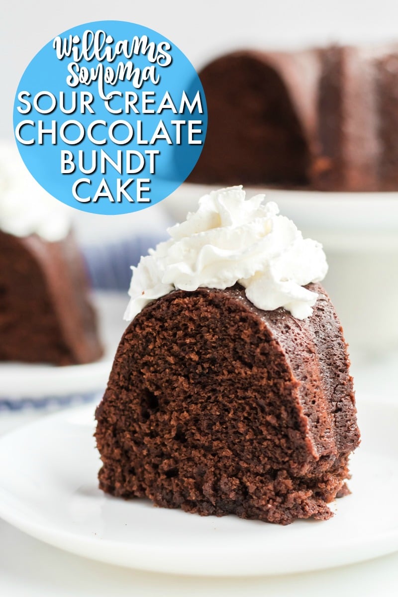 slice of chocolate bundt cake with whipped cream on white plate 