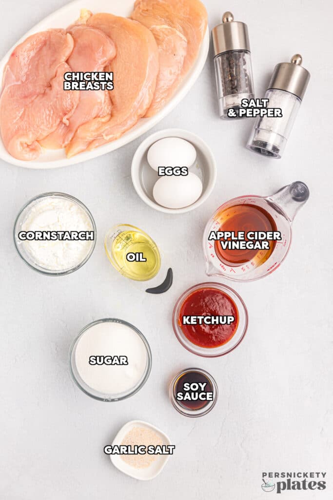 overhead shot of labeled ingredients laid out to make sweet & sour chicken.