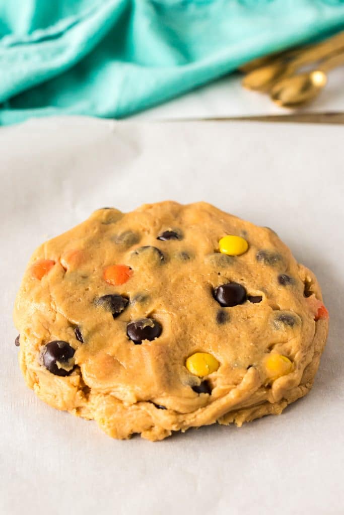 peanut butter cookie dough on a baking sheet.