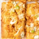 overhead shot of a sheet pan buffalo chicken pizza.