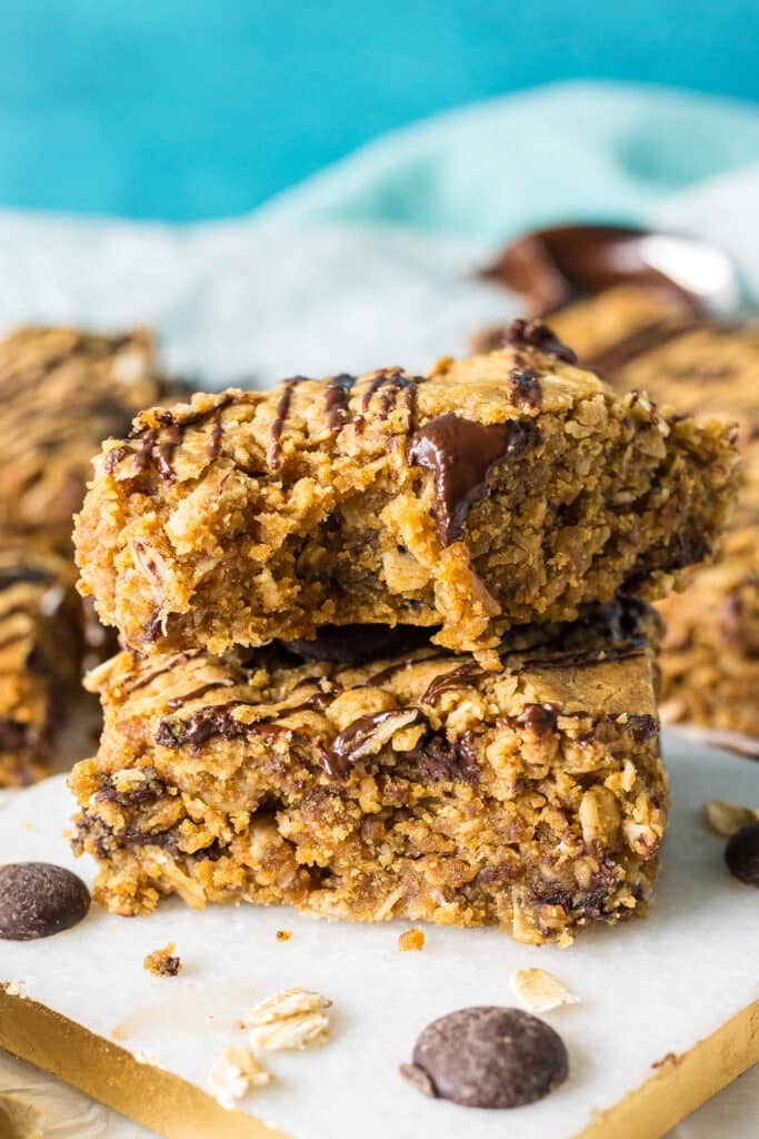 stack of two oatmeal peanut butter bars with a bite missing.