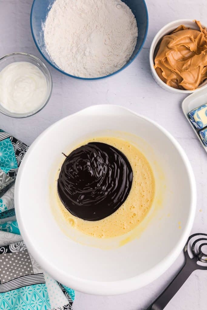 melted chocolate and butter in a mixing bowl.