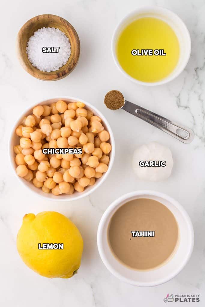 overhead shot of labeled ingredients laid out to make hummus.