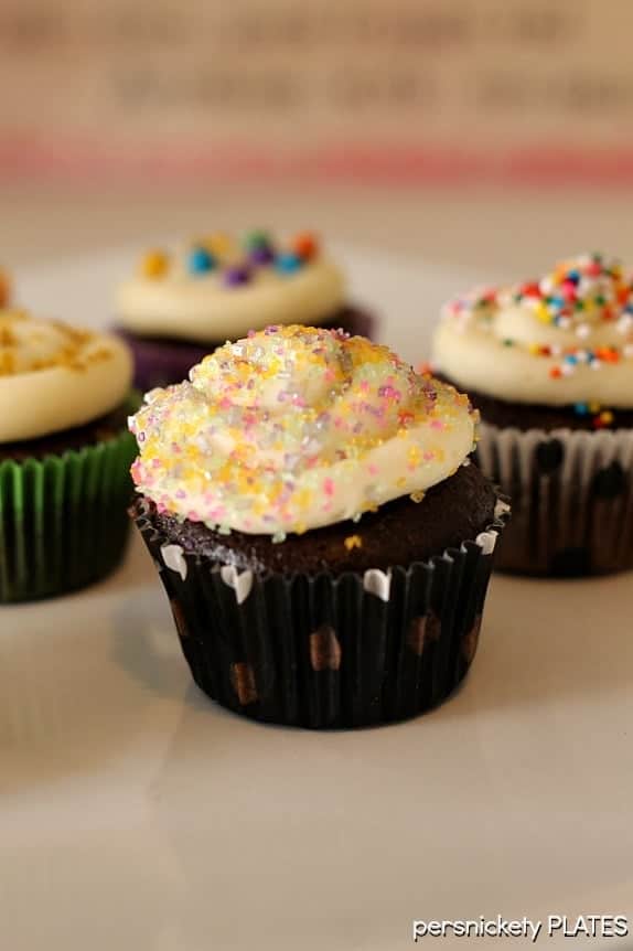 Chocolate Cupcakes Filled with Vanilla Buttercream are delicious, moist chocolate cupcakes topped stuffed and topped with a fluffy vanilla buttercream frosting. | Persnickety Plates