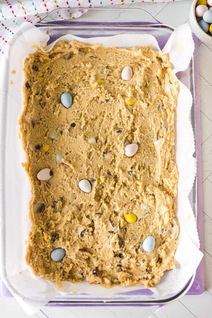 overhead shot of cookie dough in a baking dish.