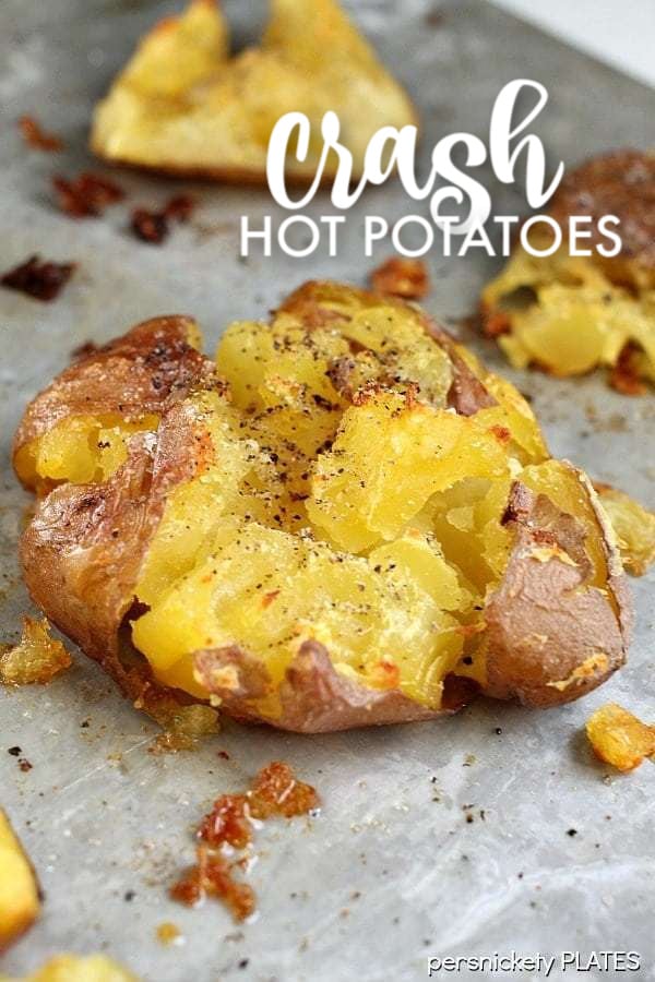 Crash Hot Potatoes are like a mix of a fluffy baked potato and a crispy french fry. The perfect side dish for your next dinner! | www.persnicketyplates.com #potatoes #sidedish #vegetarian #easyrecipe single crash hot potato on baking sheet