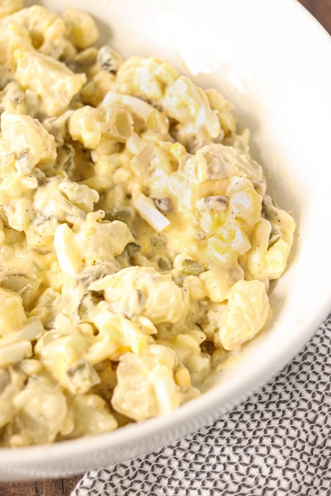potato salad in white serving bowl