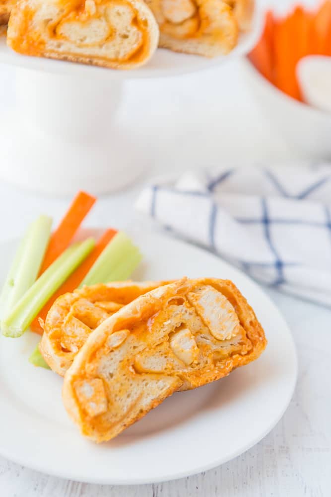 slice of buffalo chicken bread on white plate
