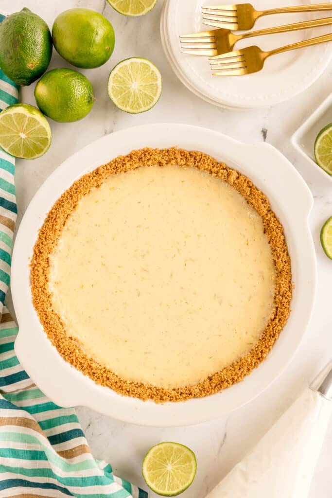 overhead shot of a key lime pie with graham cracker crust.