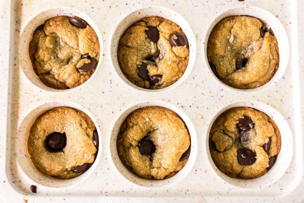 closeup of chocolate chip cookie cups in a pan.