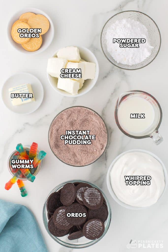 overhead shot of labeled ingredients laid out to make oreo dirt pudding cups.