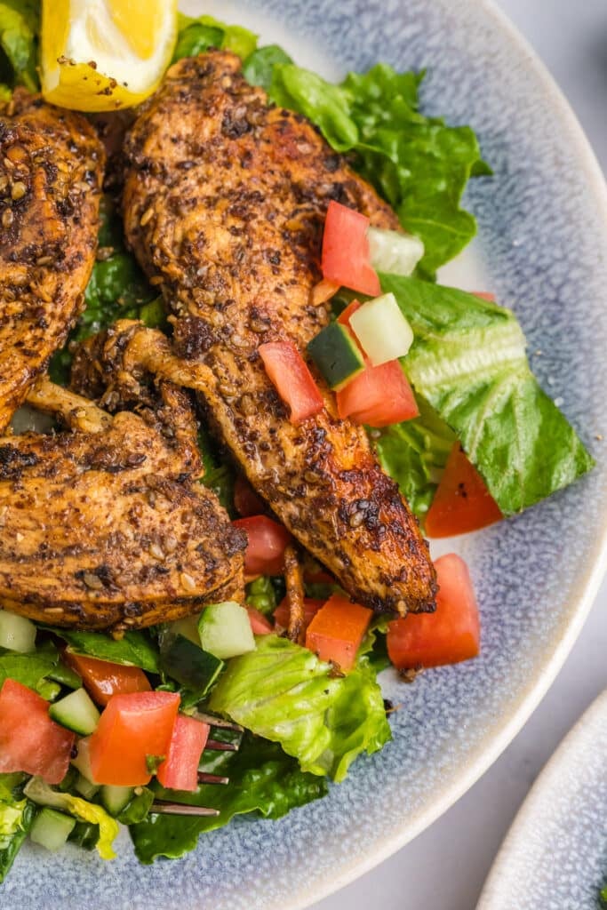 lemon & oil salad topped with seasoned chicken.