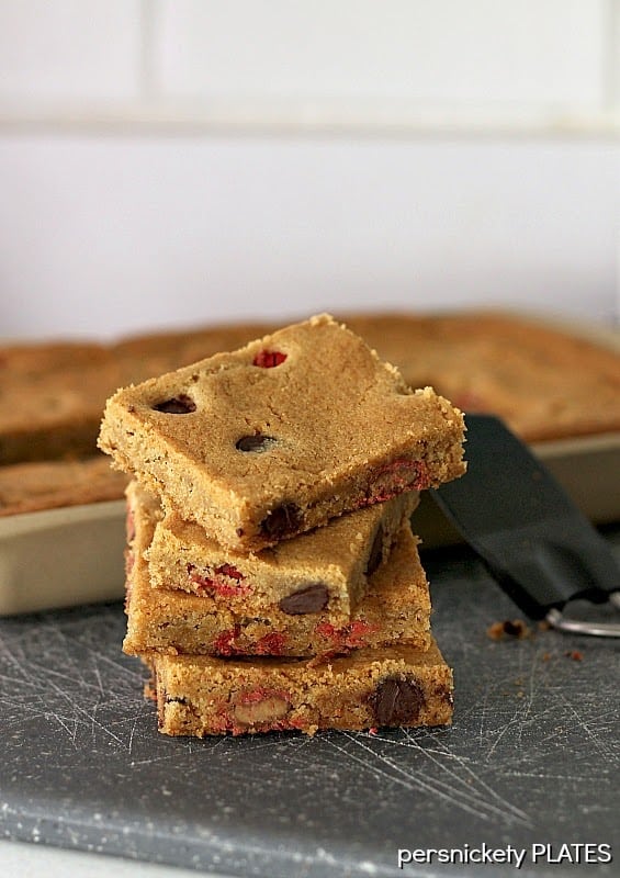 Coconut Oil Cookie Bars stuffed with Dark Chocolate Chips and Peanut Butter M&Ms! | Persnickety Plates