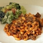 goulash on a plate with salad