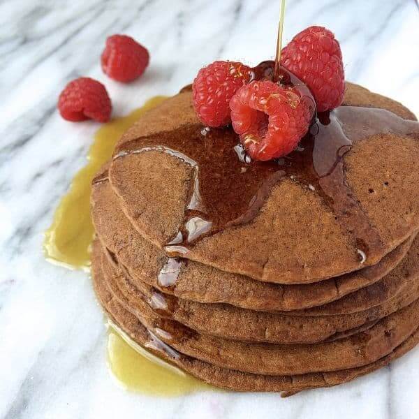 Chocolate Peanut Butter Protein Pancakes with syrup - The Lemon Bowl