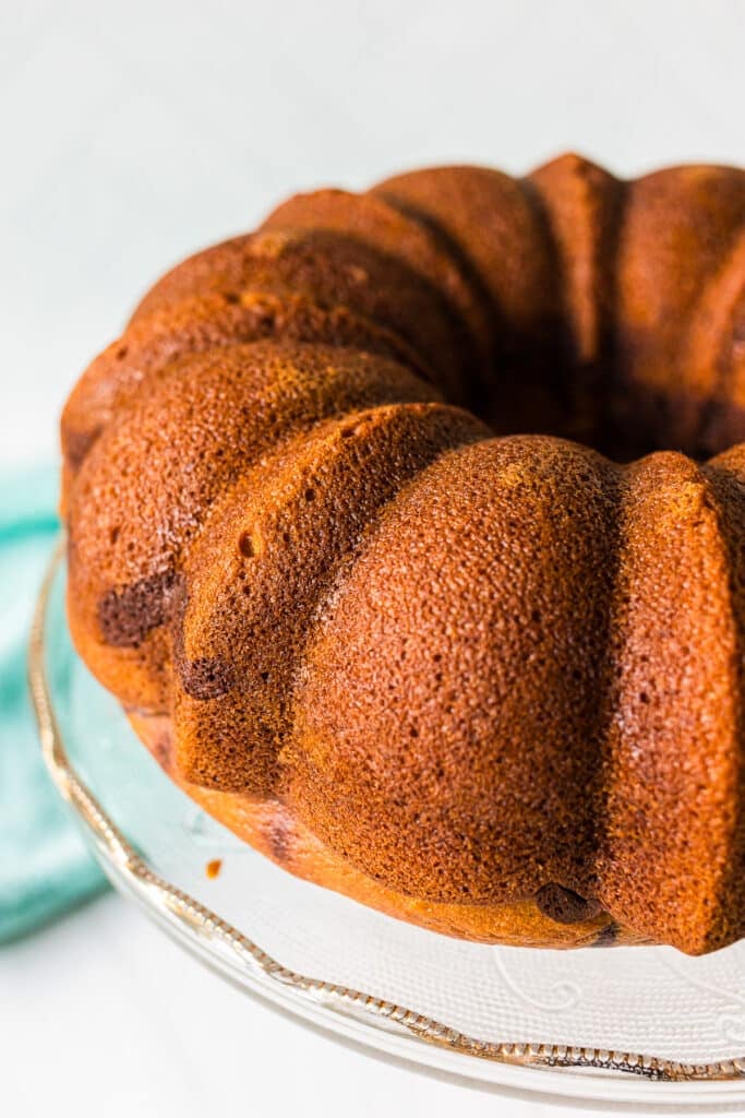 side view of a bundt cake on a plate.