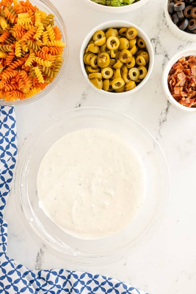 overhead shot of homemade ranch dressing in a bowl.