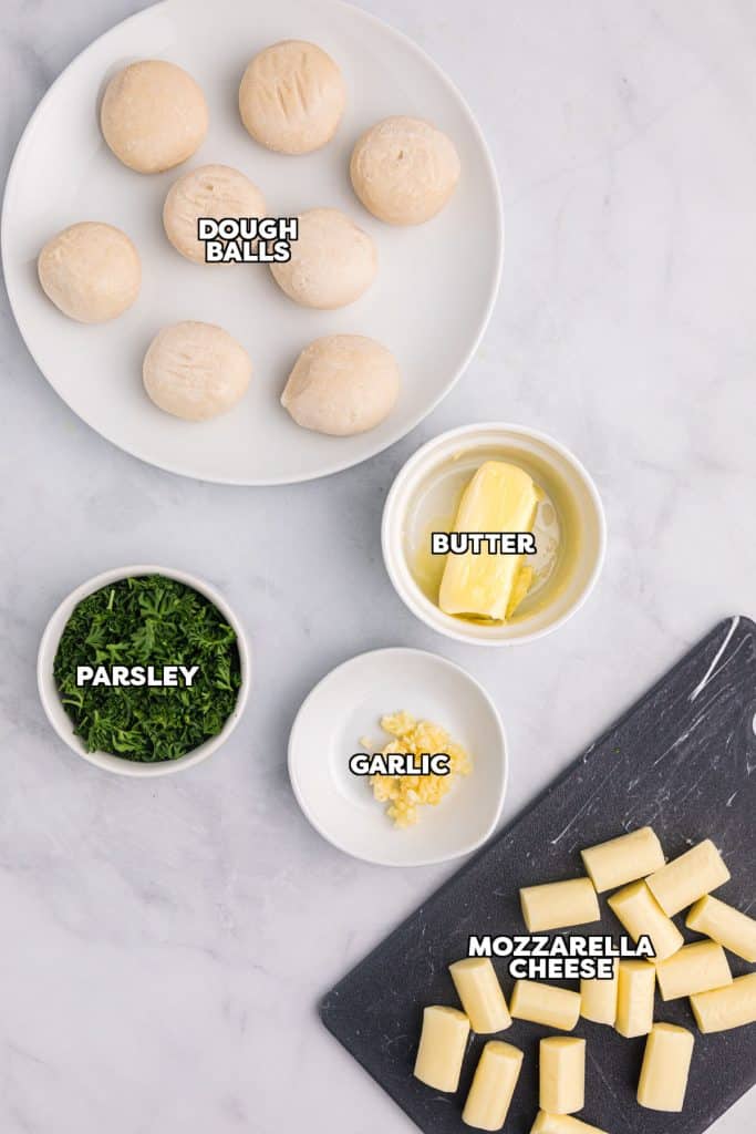 overhead shot of labeled ingredients laid out to make cheese stuffed rolls.