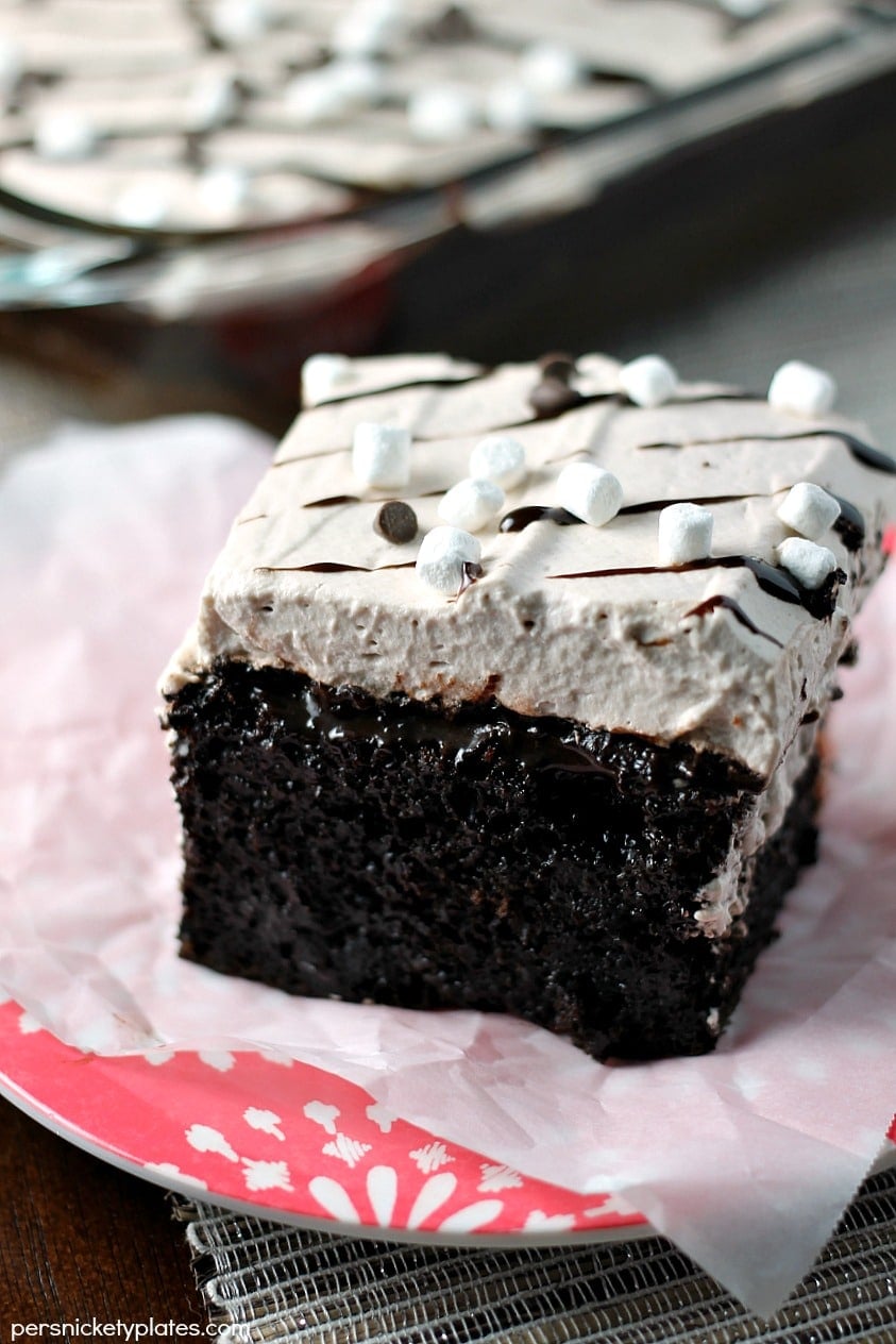 Hot Chocolate Poke Cake This Hot Chocolate Poke Cake takes everything you love about hot chocolate and puts it into cake form. Perfect for a holiday celebration! | Persnickety Plates