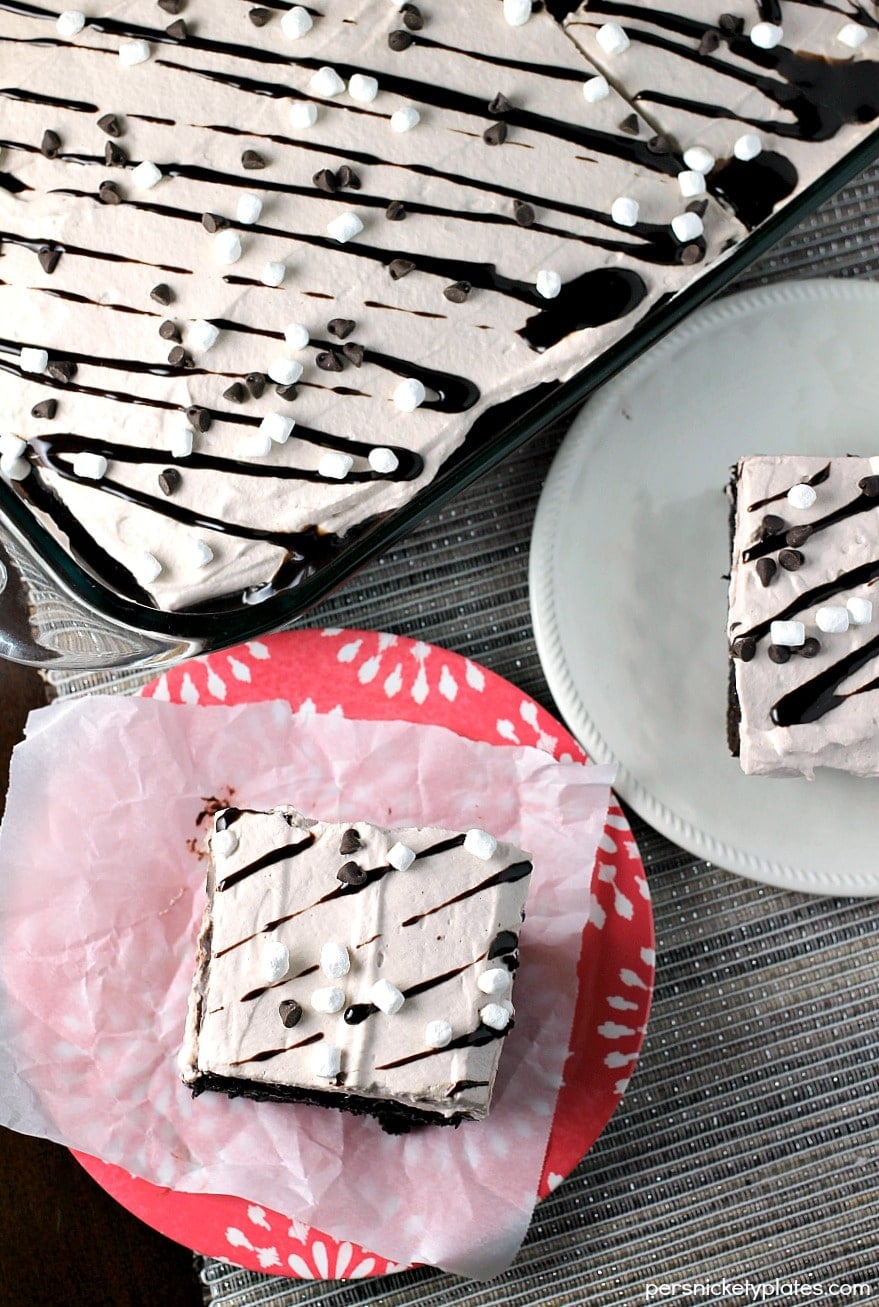 Hot Chocolate Poke Cake This Hot Chocolate Poke Cake takes everything you love about hot chocolate and puts it into cake form. Perfect for a holiday celebration! | Persnickety Plates