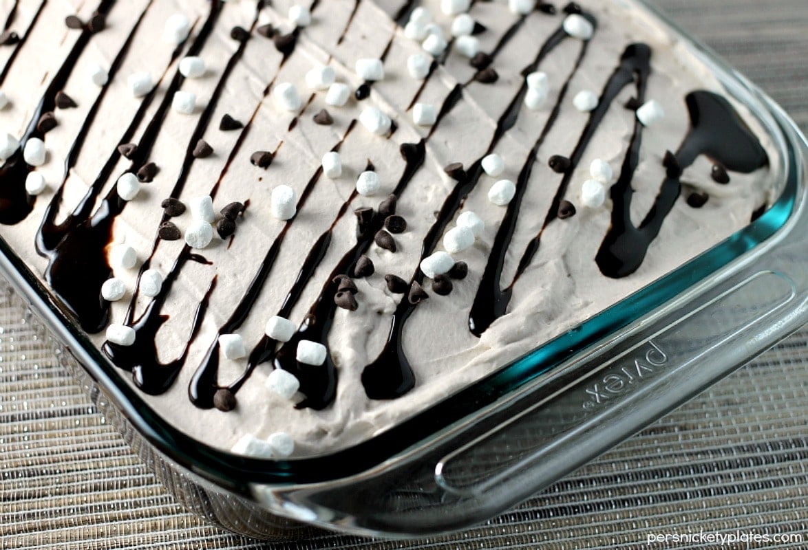 Hot Chocolate Poke Cake This Hot Chocolate Poke Cake takes everything you love about hot chocolate and puts it into cake form. Perfect for a holiday celebration! | Persnickety Plates