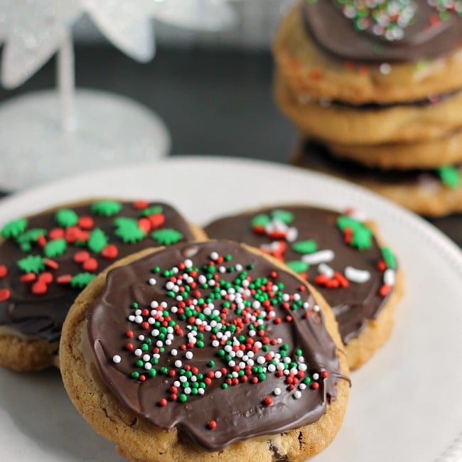 A brown butter chocolate chip cookie slathered with a layer of salted caramel then topped with chocolate and sprinkles. | Persnickety Plates